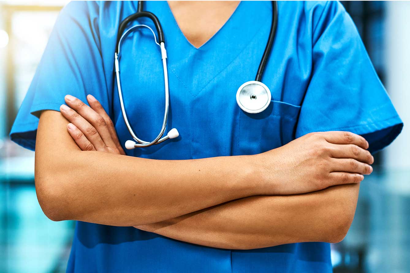 nurse in blue scrubs